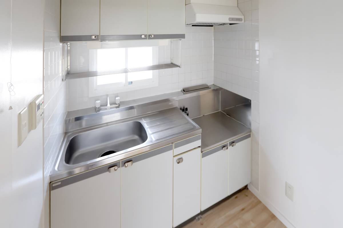 Khu vực bếp của Village House Hassamu ở Nishi-ku