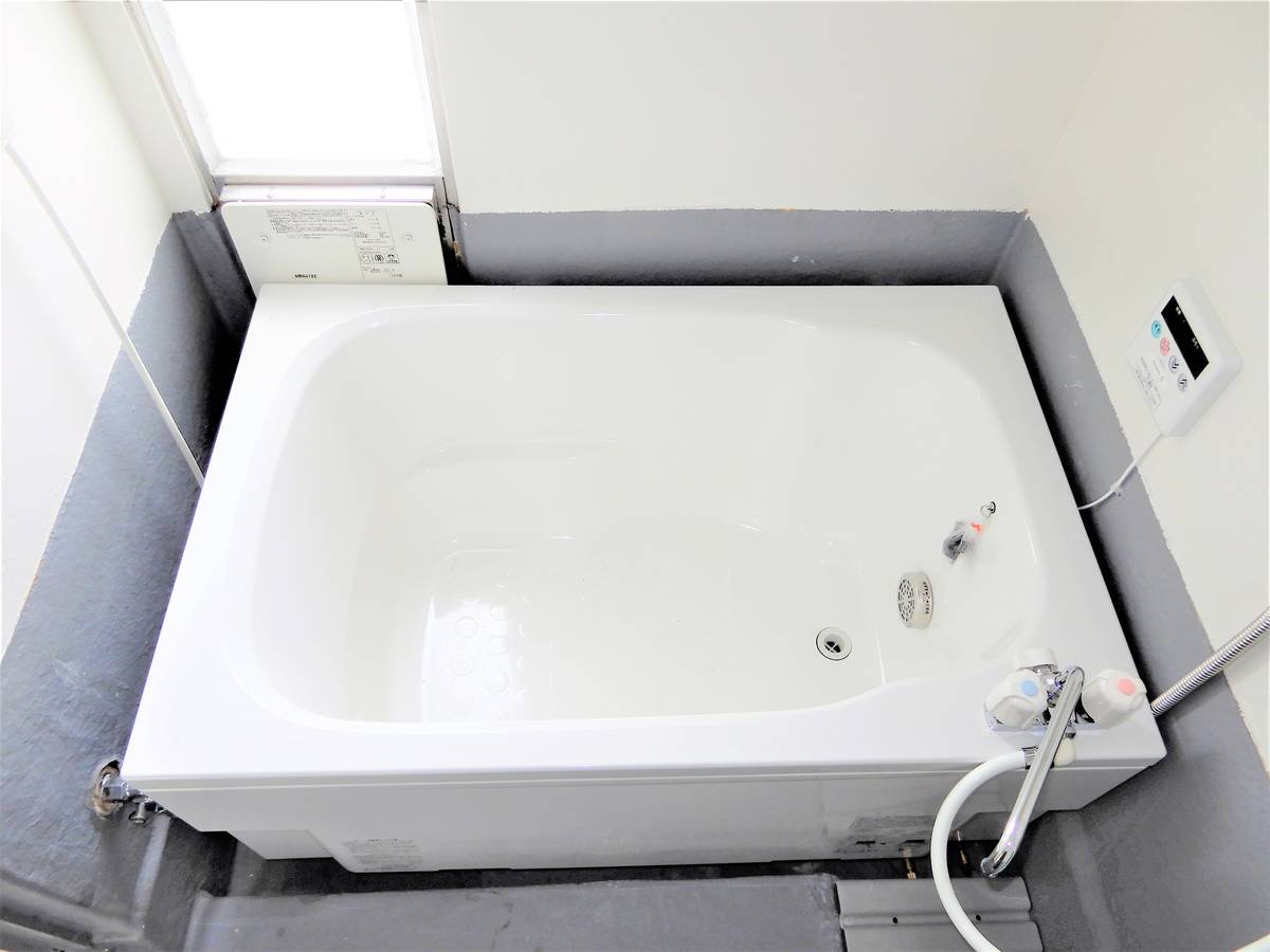 Phòng tắm của Village House Rokuta ở Higashine-shi