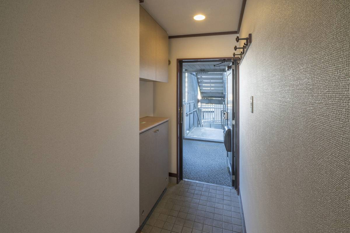 Entrada do apartamento de Village House Kyougamine Tower em Toyota-shi
