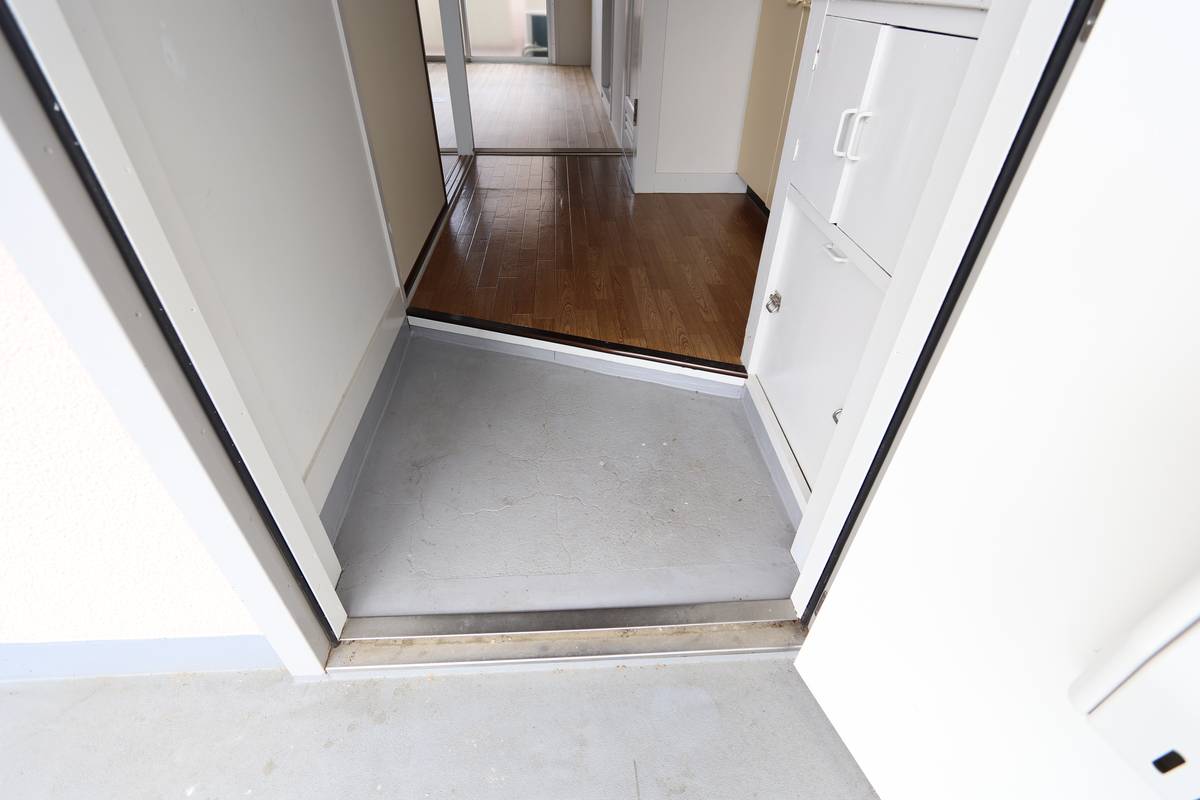 Khu vực cửa ra vào Village House Yasufuruichi ở Asaminami-ku