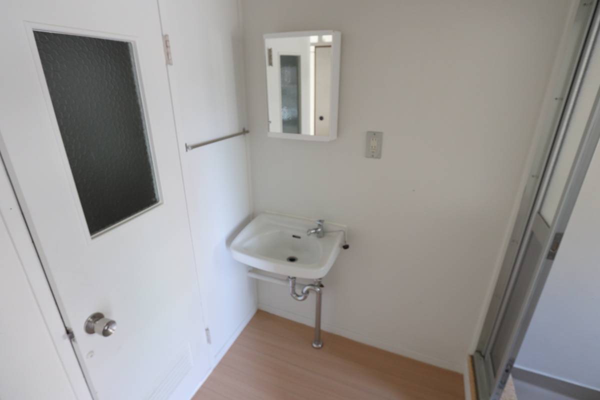 Lavabo de Village House Miyagasako em Kure-shi