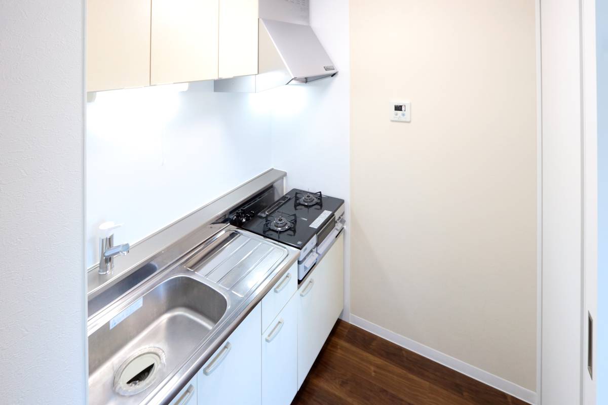 Khu vực bếp của Village House Numakoyanagi ở Kokuraminami-ku