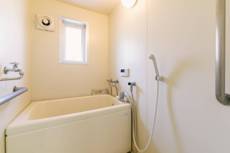 Phòng tắm của Village House Suko ở Omura-shi